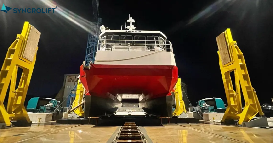 Katamaran on shiplift with support arms on display